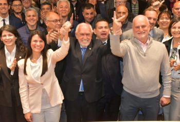 Alberto Biglieri y referentes de Unidad en Defensa de la Abogacía durante una celebración