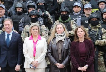 Funcionarios y personal federal en el acto por la primera fase del traslado de Devoto a Marcos Paz.